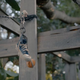 marcel on a string with a shoe